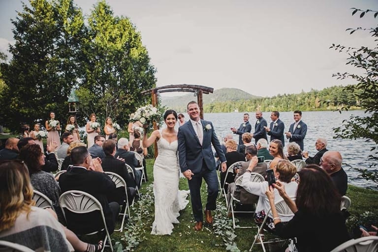 newly married couple wedded on shore