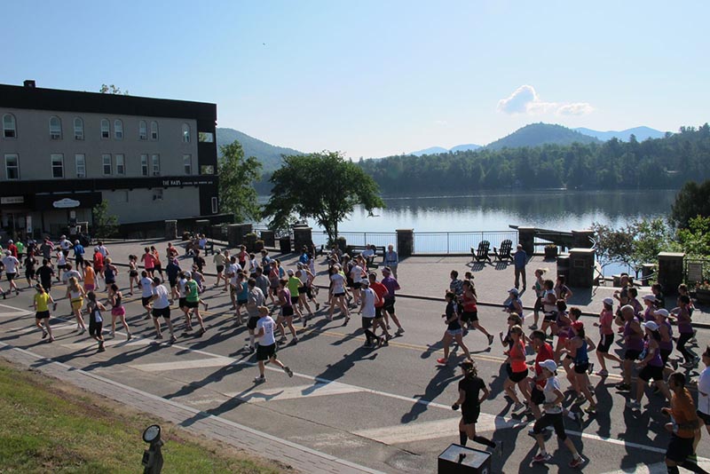 marathon group of people running in Lake Placid Marathon
