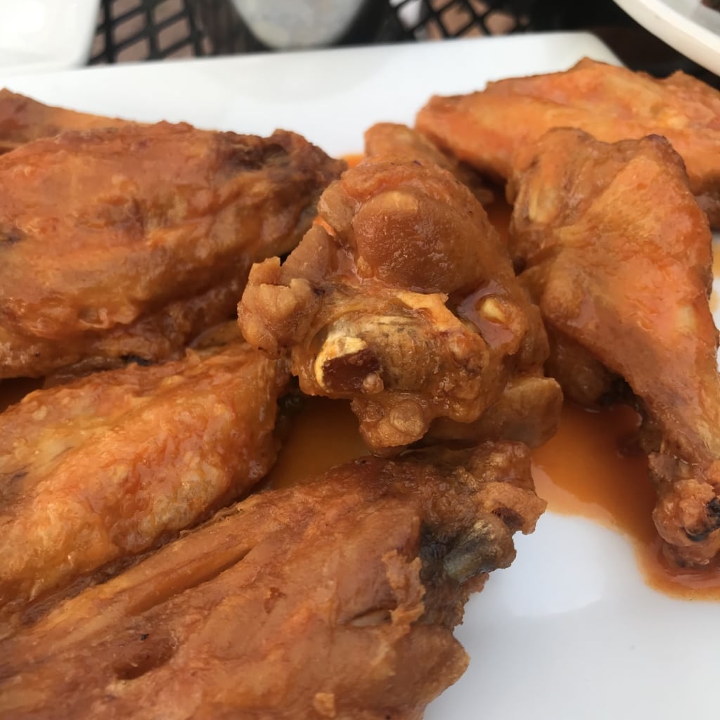 close up of wings from lisa g's