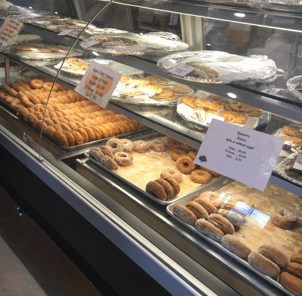 baked goods case with donuts