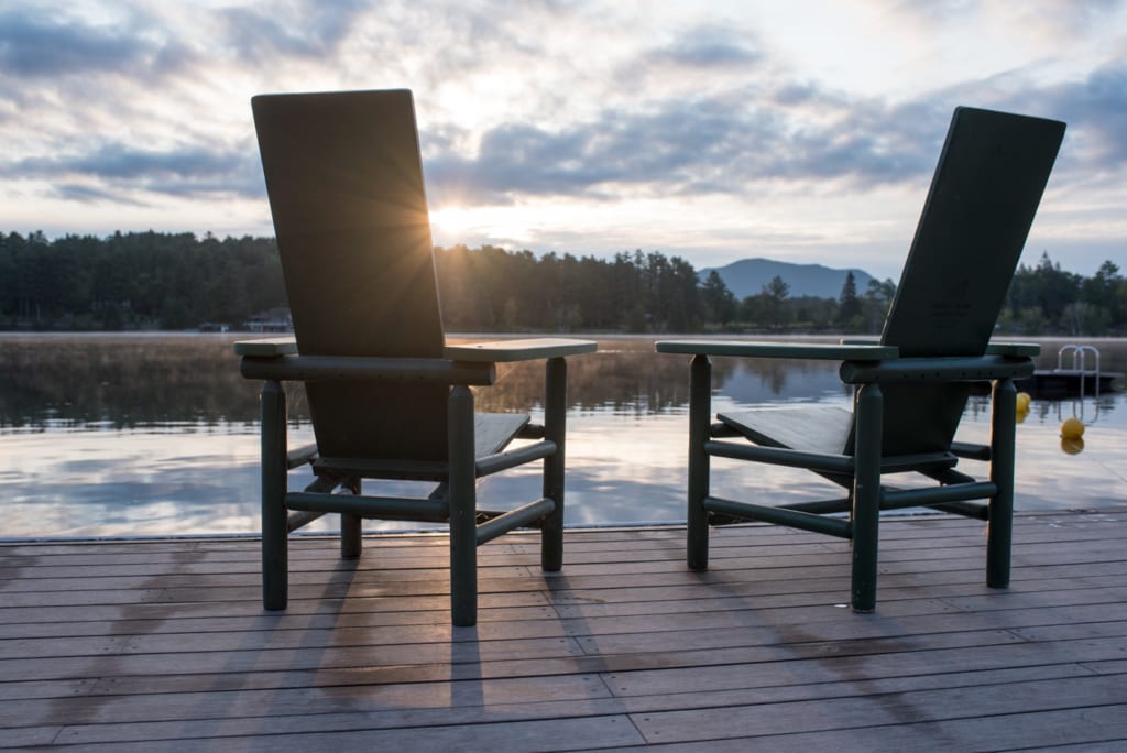 2 adirondack chairs on dock