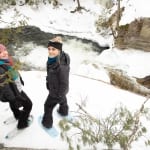 two girls Snowshoeing at the flume trails