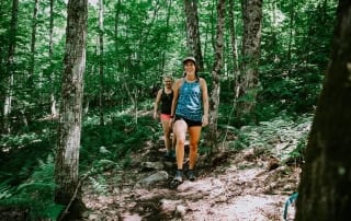 two girls hiking at mt van hoevenberg