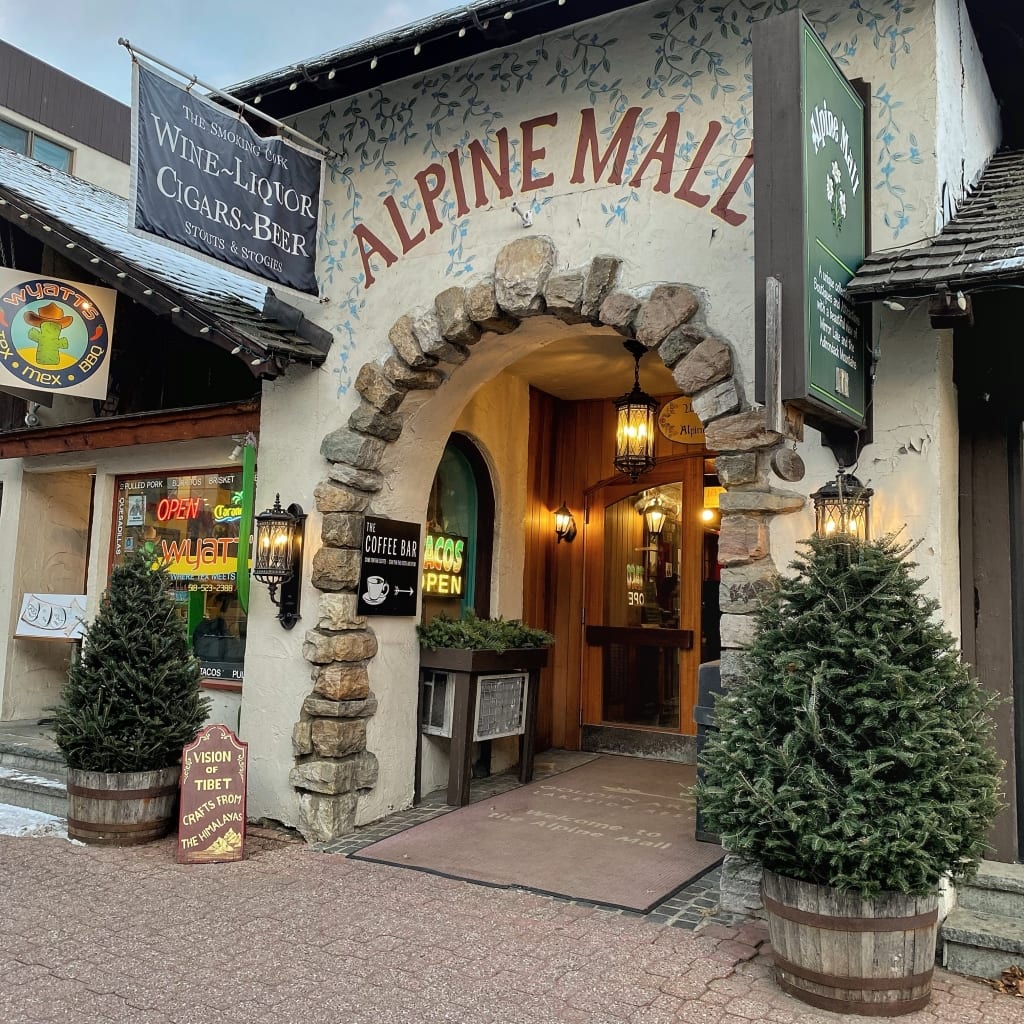 Alpine Mall stone arch entrance