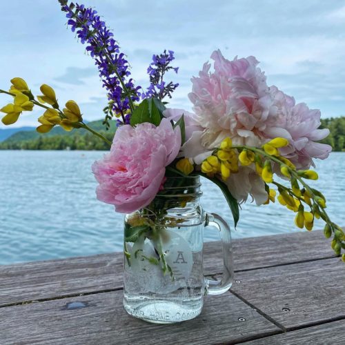 Mason Jar with Flowers by the lake