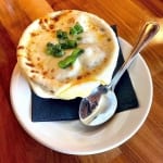 Onion soup covered in cheese