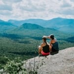 Two women on Mt Van Hoevenberg vista overlooking valley