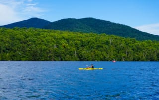 Photo of a person Kayaking Adirondacks