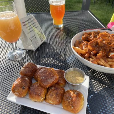 Enjoy a draft and locally made pretzel nuggets from Big Slide Brewery