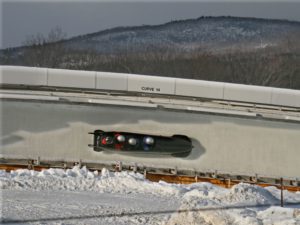 Photo of a person bobsledding: One of the top Lake Placid winter activities 