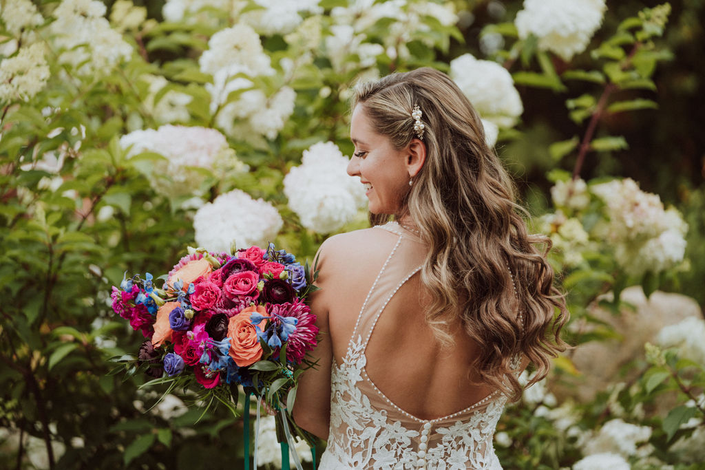 Bride by flower garden