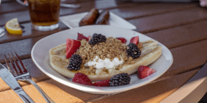banana with berries, yogurt, and granola