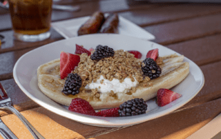 banana with berries, yogurt, and granola