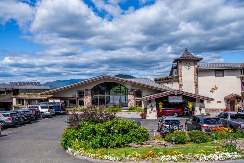 Golden Arrow Lakeside Resort on Main Street Lake Placid features lobby windows overlooking Mirror Lake