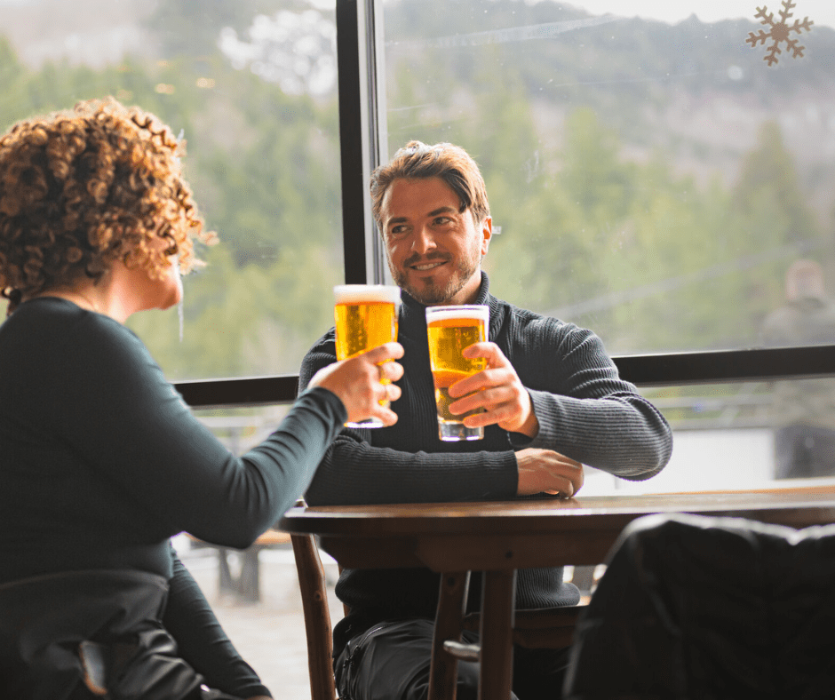 A Couple’s Guide to the Perfect Winter Date in Lake Placid includes drinks on main street